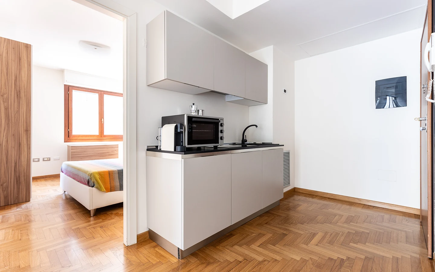 Relis Immobiliare – Agenzia Immobiliare a Quartu Sant’Elena – Affitto Breve Estivo – Appartamento Corner House a Cagliari – Cucina Appartamento Corner House